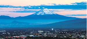 Así se ven los majestuosos volcanes Iztaccíhuatl y Popocatépetl en el horizonte de Ciudad de México