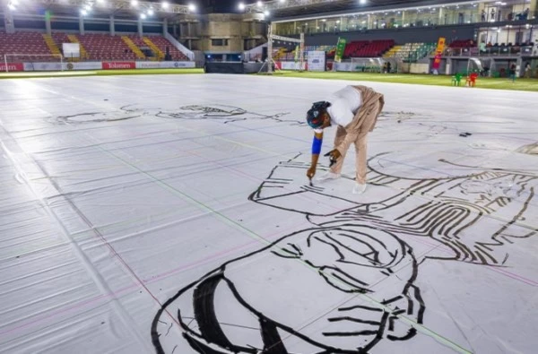 Artista nigeriano crea dibujo más grande del mundo por amor a su país